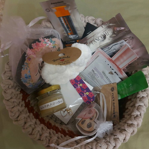 Knitted basket like new with gifts made of macrame cord