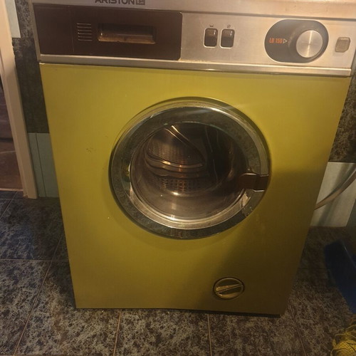 Vintage 1970s home appliance set used, General Electric fridge, Kenmore stove, Ariston washer