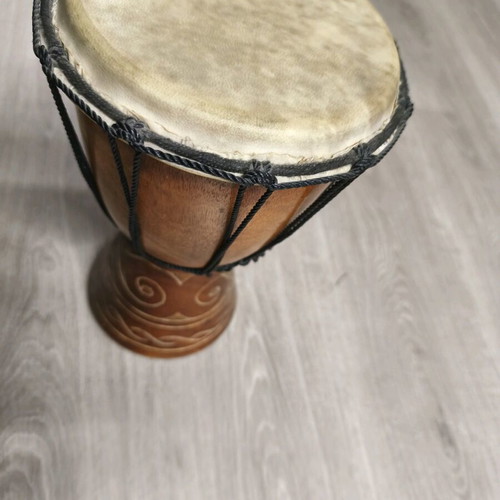 African handmade djembe used, wooden with skin