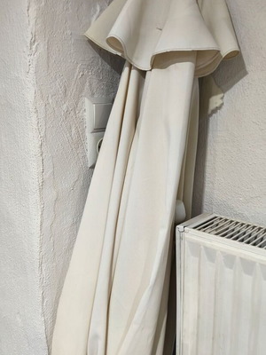 Veranda umbrella used with small tear