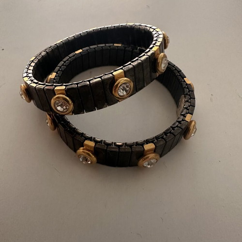 Elastic metallic bracelet set used, black and silver