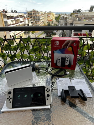 Nintendo Switch OLED modded with Dual Boot and 128GB SD like new