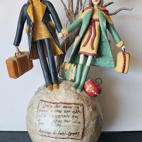 Handmade sculpture couple on globe by Nasia Soul