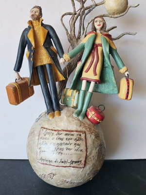 Handmade sculpture couple on globe by Nasia Soul