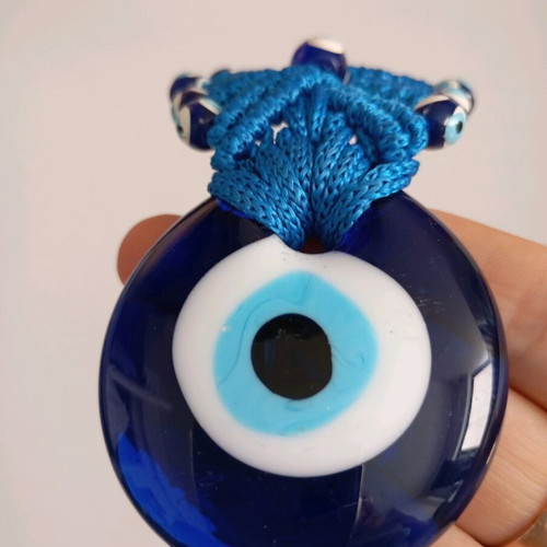 Glass eye charm used
