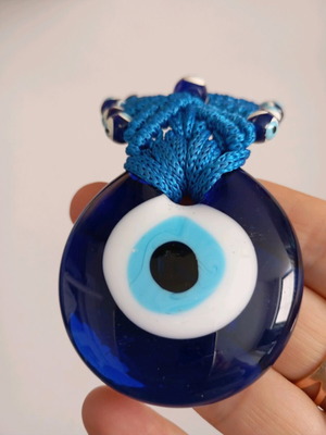 Glass eye charm used