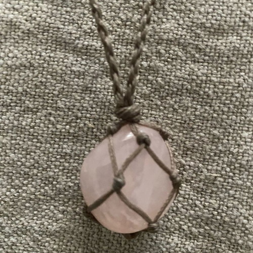 Boho long pendant like new with cord and pink stone