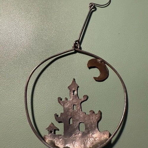Handmade castle earring like new, silver and gold colors
