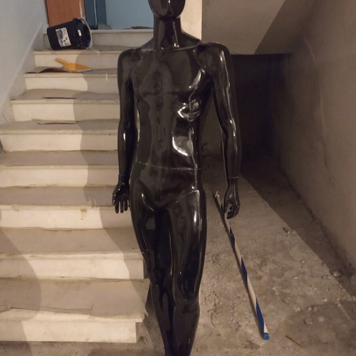 Mannequin used, glossy black male display doll