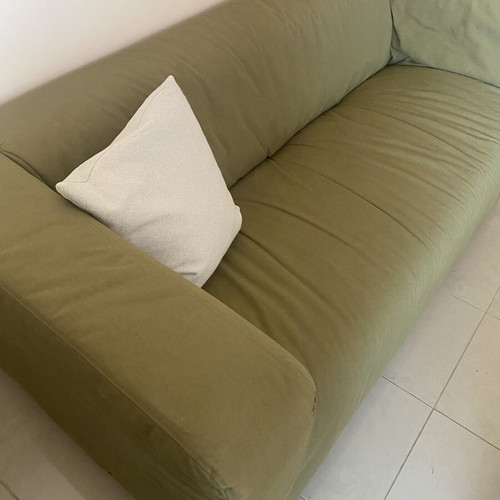 Two-seater sofa with khaki cover