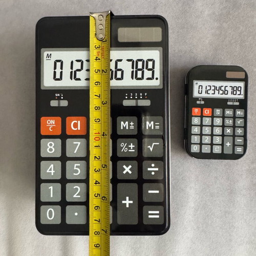 Storage boxes shaped like calculators, set of 2, like new