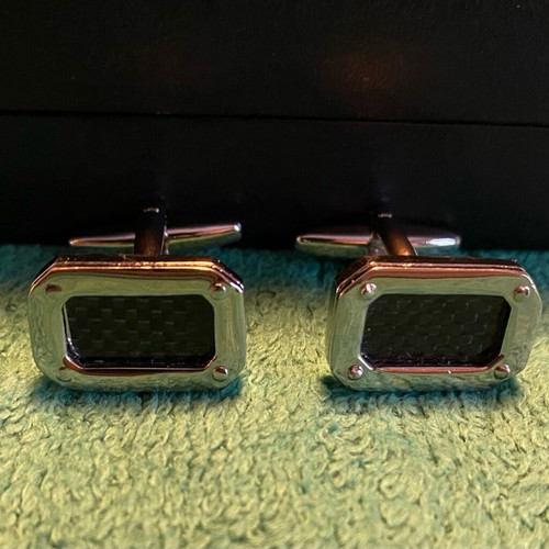 Tie rack cufflinks used, black