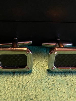 Tie rack cufflinks used, black