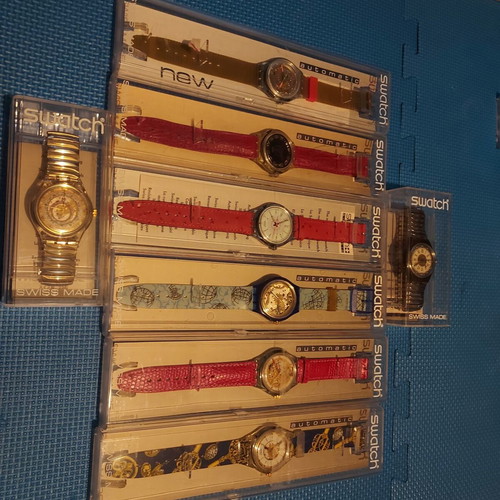 Swatch watches set with 7 new unworn and 1 worn