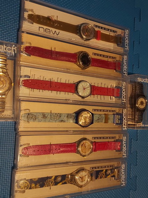 Swatch watches set with 7 new unworn and 1 worn