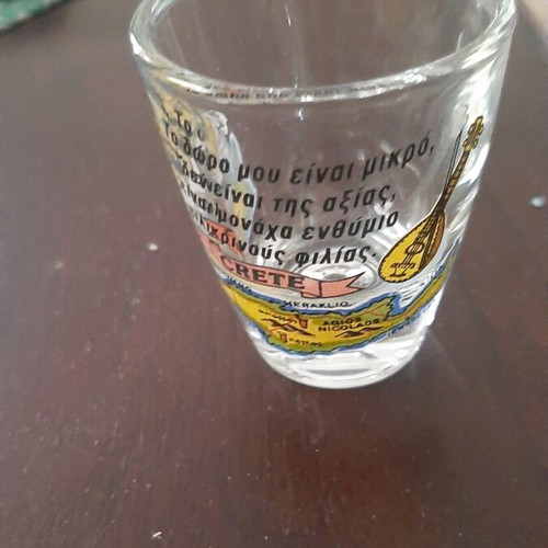Souvenir shot glass new from Crete with mantinada about friendship