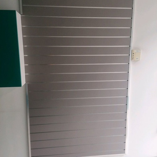 Slat panel store equipment used, silver MDF with hooks