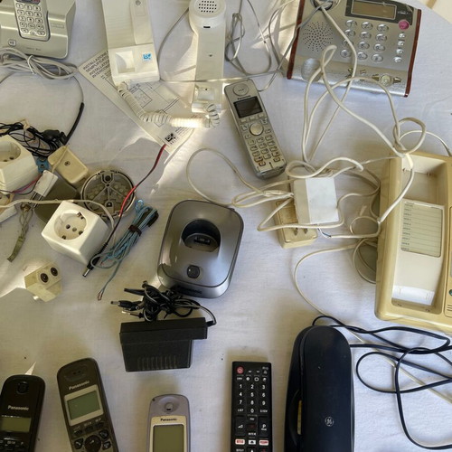 Set of old cables, sockets and telephony devices used