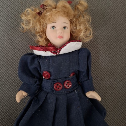 Porcelain doll small used, decorative for baby room or gift