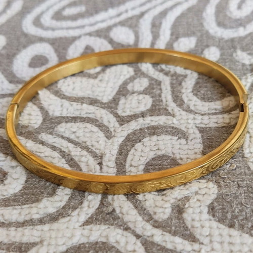 Gold-plated steel bracelet like new, openable