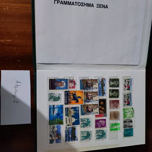 Various stamps used in 3 albums