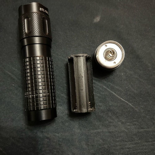 Walther STL100C handheld flashlight used, non-working, LED, for parts only