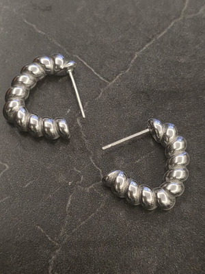 Earrings stainless steel silver color like new with unique design