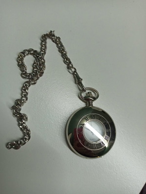 Pocket watch used, silver color with chain