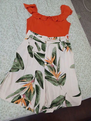 Beige shorts and orange top set