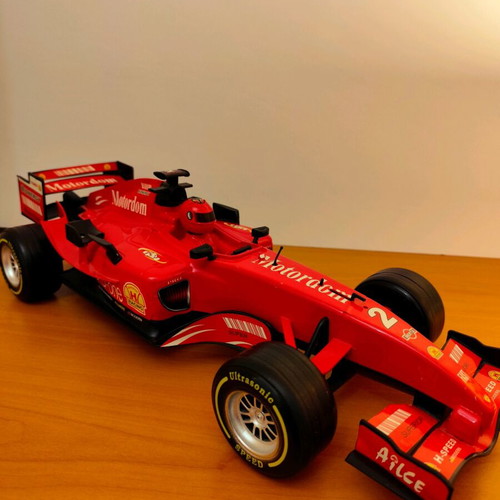 Formula and Ferrari toy cars used, set of 2, battery operated