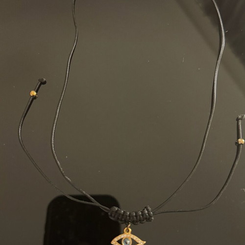 Adjustable necklace with cord and eye charm with rhinestones, new, black and gold