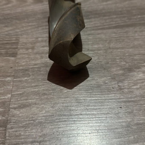 Large metal twist drill bit used with Morse taper shank