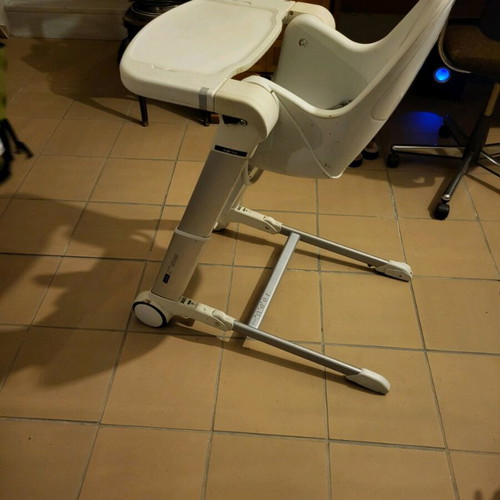 Inglesina high chair used with height adjustments and foldable storage