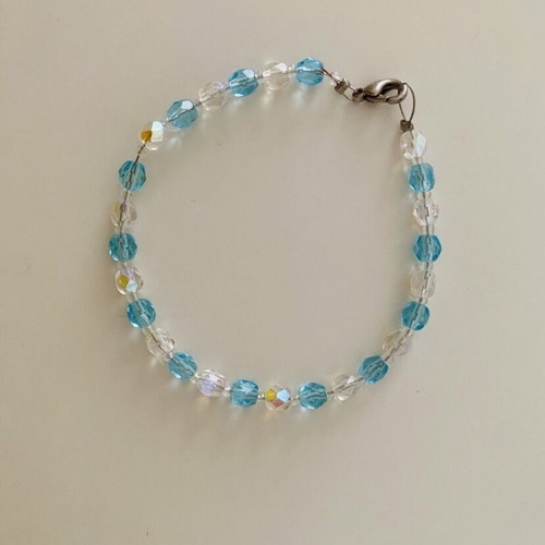 Bracelet with white and blue stones used