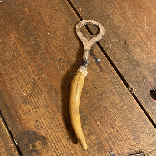 Vintage bottle opener used, height 16.5 cm