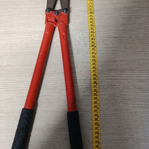 Bolt cutter with red handles and anti-slip grips