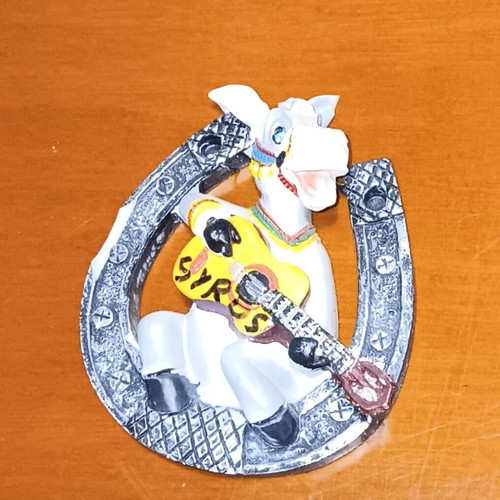 Syros magnet like new, horseshoe with donkey playing guitar