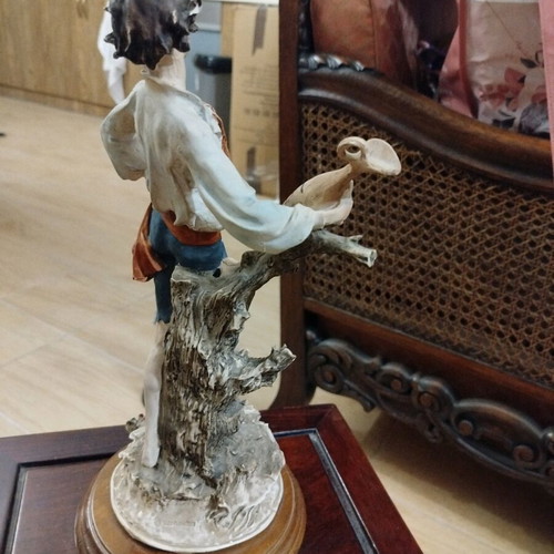 Boy statue with wooden base like new, height 35cm