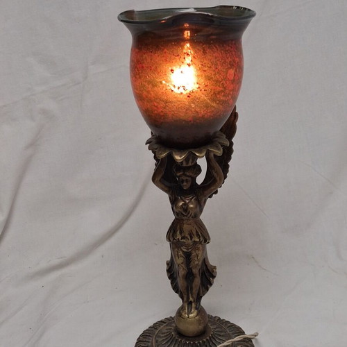 Art Nouveau table lamp with winged female figure and artistic glass shade