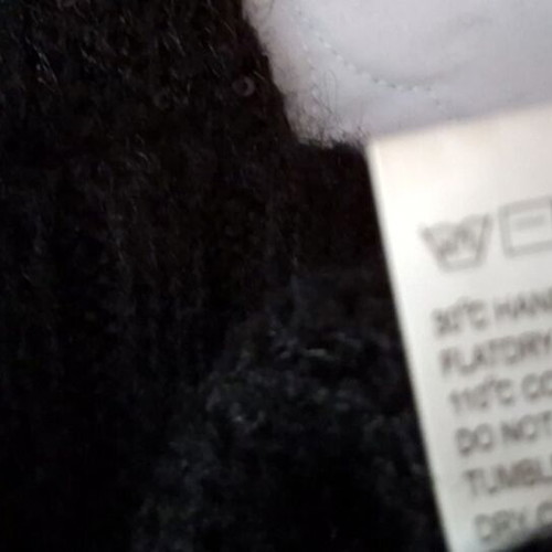 Black knitted mini dress like new with cable knit collar and sequins