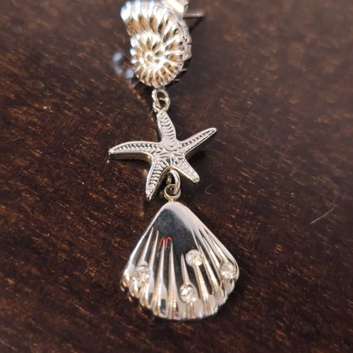 Silver earrings with shells and starfish like new
