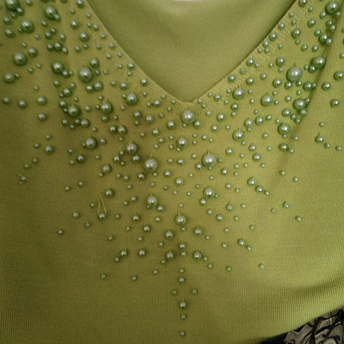 Knitted top used green lime with green pearls, size S
