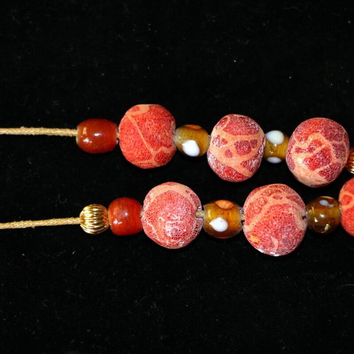 Begleri with genuine coral and 22K gold-plated beads, handmade by Indico Jewells