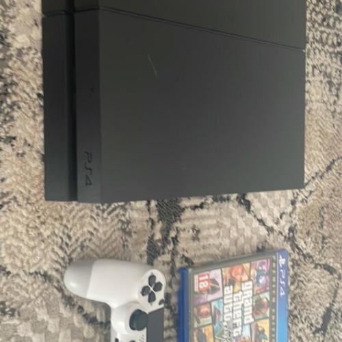 PlayStation 4 console 1TB with controller and game, like new