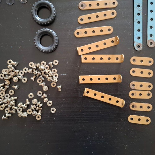 Metal construction toy used with wear