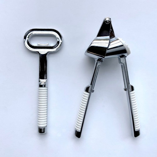 Pedrini P.P.L. garlic press and bottle opener set used