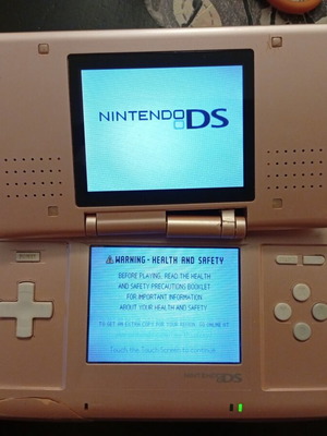 Nintendo DS console Metallic Rose used for repair or parts