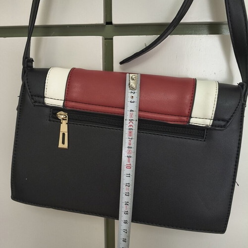 Shoulder bag with adjustable strap, black and red