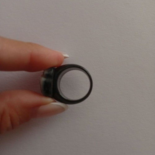 Ring like new black plastic rose shape