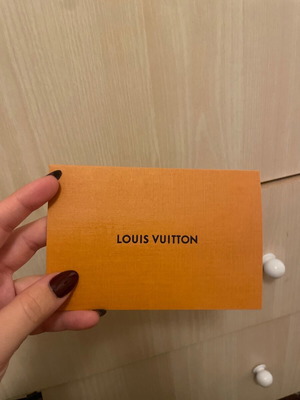 Louis Vuitton card new orange with black logo